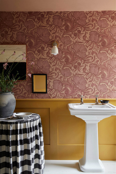 Bathroom with pink floral wallpaper (Poppy Trail - Masquerade) on the upper wall and yellow on the bottom half (Yellow-Pink).