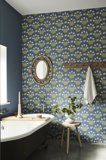 Bathroom with snail-printed wallpaper (Burges Snail - Juniper) on back wall and deep blue (Juniper Ash) on left wall.